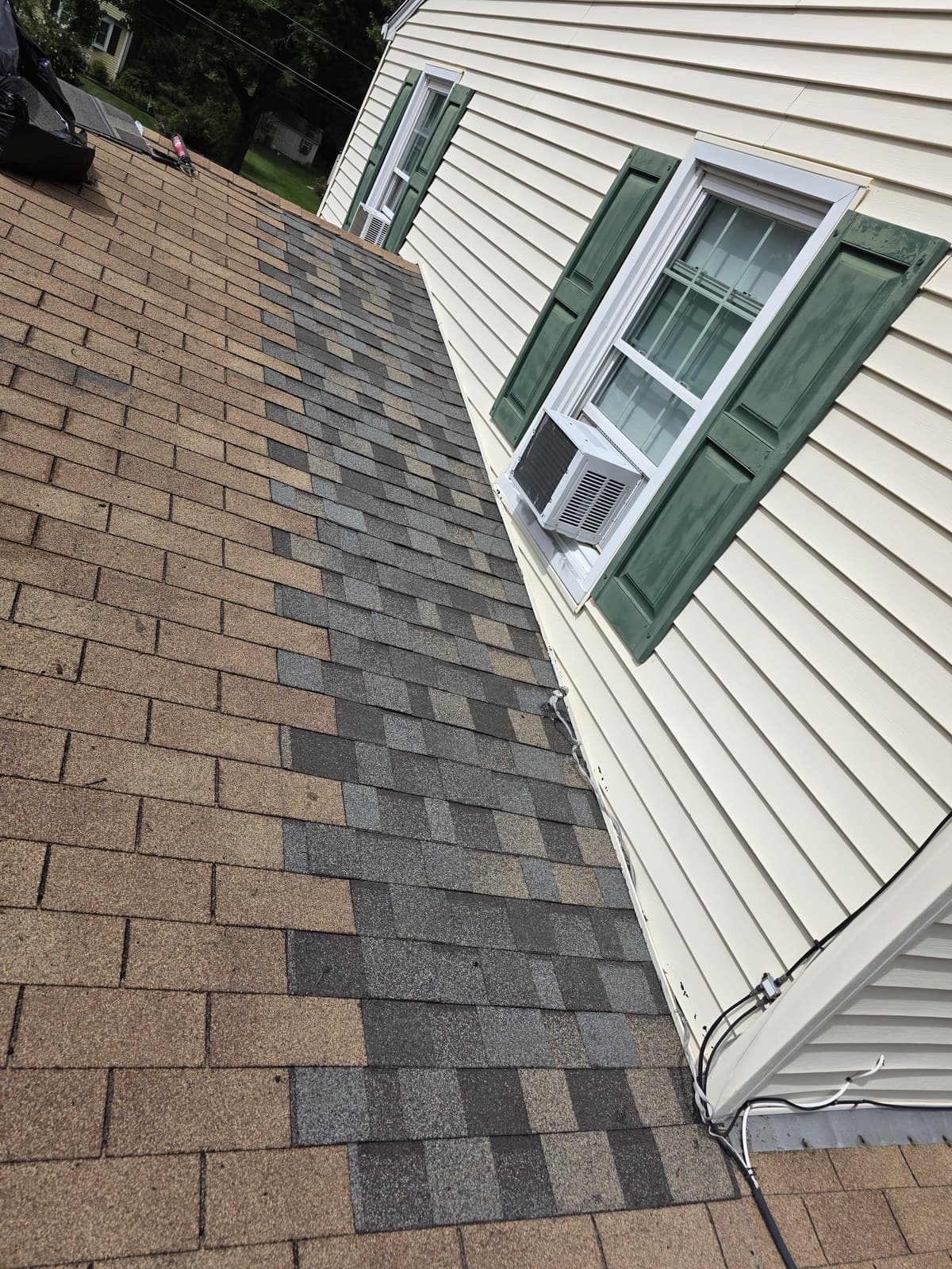 New shingles at the completed roof-to-wall repair in Suffield, Connecticut