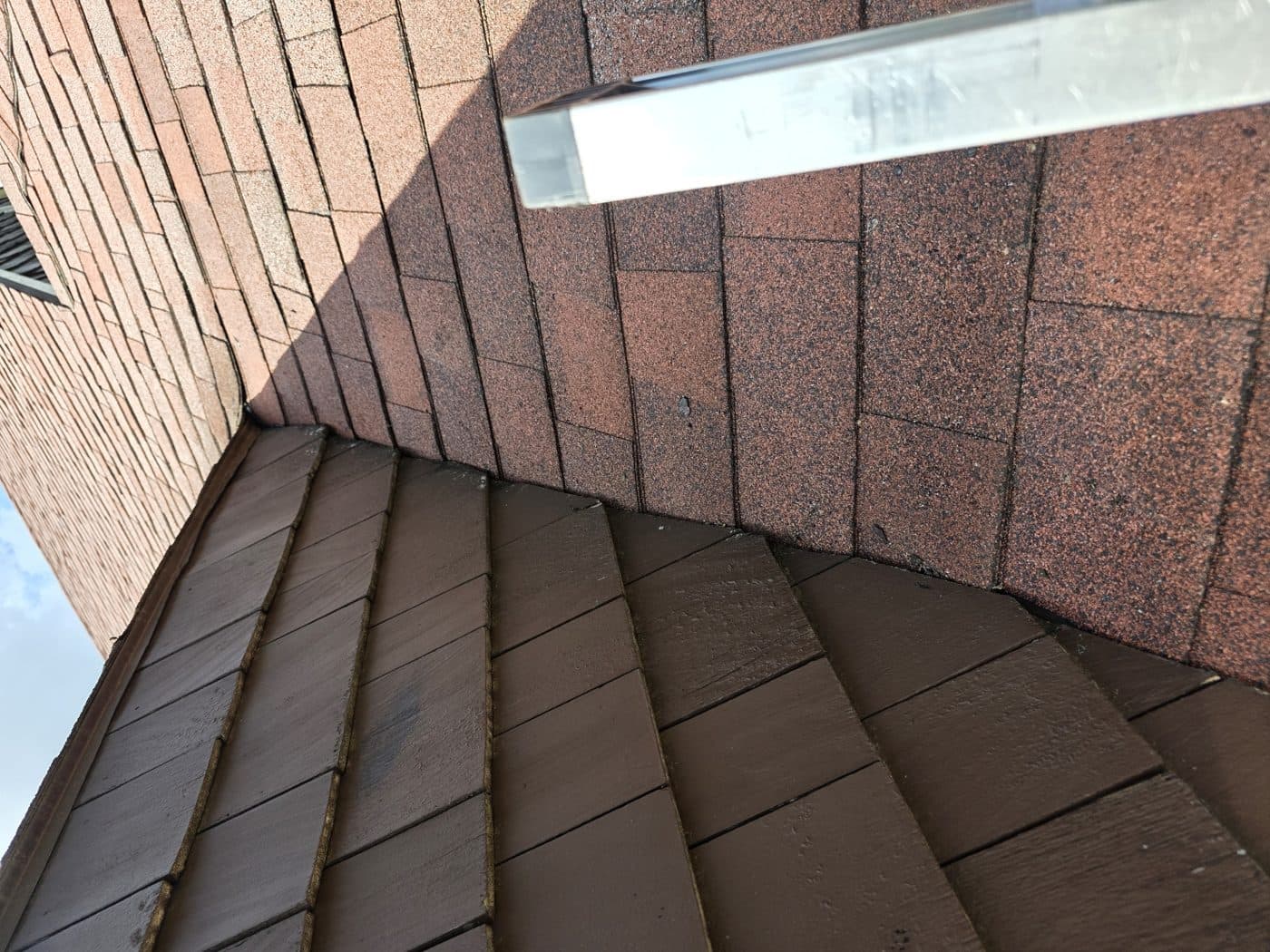 Finished roof-to-wall junction repair by Trust Proof Roofing in New Britain, Connecticut