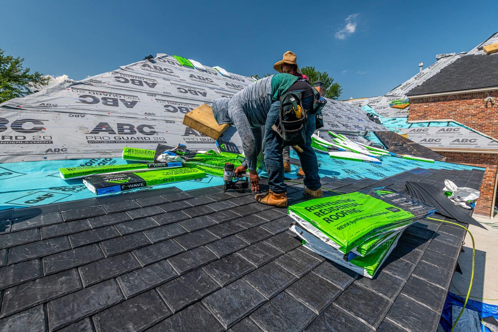 Local Trust Proof Roofing crew installing an asphalt shingle roof in Connecticut